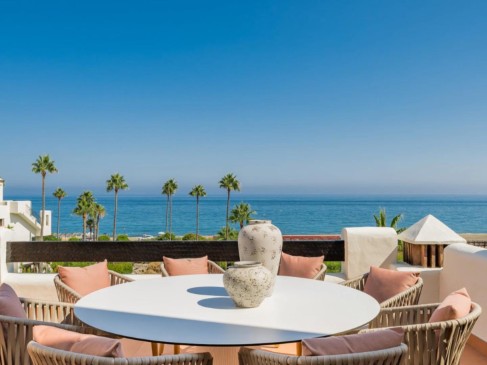 Key-ready beachfront penthouse on the New Golden Mile with a usable solarium terrace